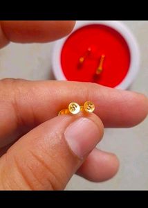 Two Pair Of Gold Earrings