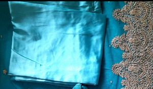 Embellished Fabric Net Saree With Silk Petikot