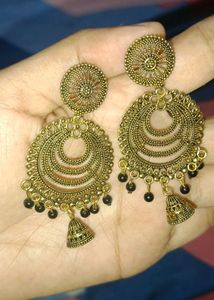 A Pair Of Traditional Style Earrings