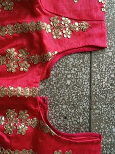 Beautiful Carrot Colour Blouse With Back Design