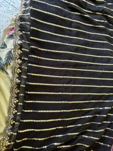 Elegant Black Georgette Saree with Graceful Drape