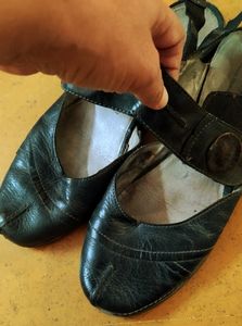 Black flat closed toe sandals
