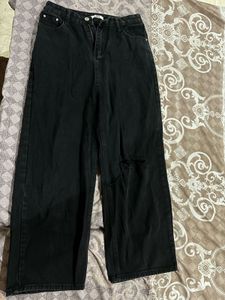 Combo of brown dress and black wide leg jeans