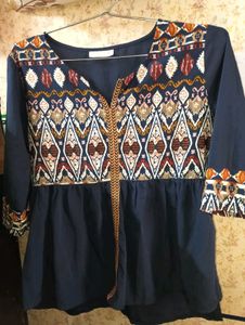 Branded Blue Top.