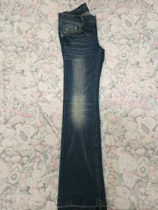 Thrifted 90s flared denim.