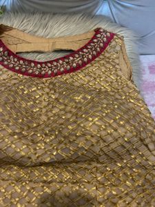 Backless golden choli