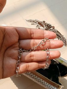 Silver Clutch With A Strap