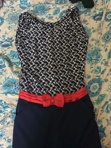 Navy Blue Sleeveless Striped Jumpsuit | Knee-Lengt