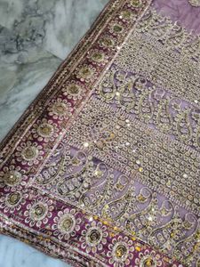 Heavy Work Purple Net Saree With Shiny Petticoat.