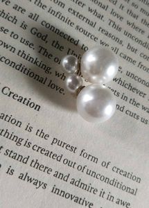 pearl stud earrings.