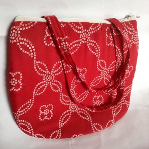 Read Colore Bandhani Print Handbag👜