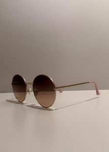 MINISO round rose‑tinted sunglasses