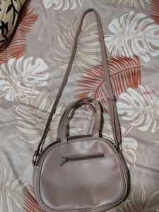 Dera Handbag with Floral Accent