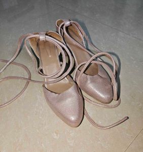 Tie up pink glitter heels