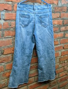 Light blue wide-leg jeans.