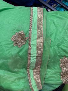 Green Fabric with Gold Embroidery