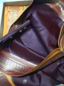# Party Wear Maroon Silk Saree Golden Border.