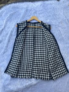 Sleeveless Tweed Sweater