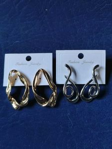 Fashionable Silver and golden Tone Dangle Earrings