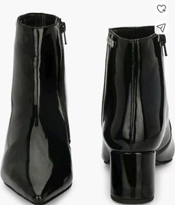 women black heeled Chelsea boots