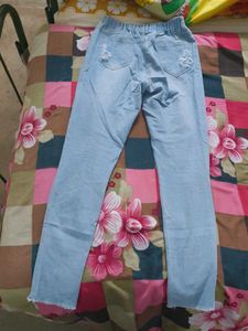 Ripped Light Blue Jeans