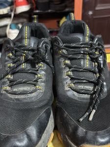 UK-10 Black and Yellow Skechers Trekking Shoes
