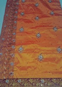 Orange  and maroon Embroidered Saree