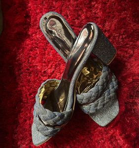 Iridescent silver kitten heels