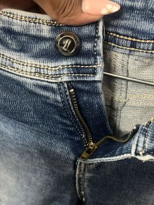 Distressed Denim Jeans