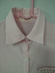 Baby pink button-down shirt