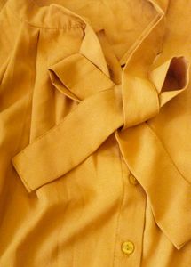 Mustard Sleeveless Bow Top