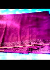 A Purple Colour Saree With Blouse