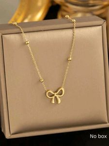 Gold Bow Pendant Necklace