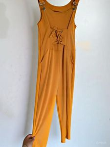 Mustard Jumpsuit with Lace-Up Detail