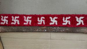 Red &amp; White Swastika Fur Woolen Readymade Rangoli
