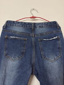 Ripped Blue Denim Jeans