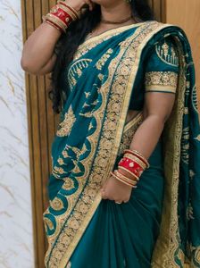 Elegant Teal Embroidered Saree