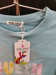 Women&#39;s Top With Tages