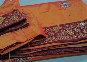 Elegant Orange and maroon  Embroidered Saree