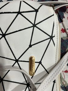 Geometric Textured White Sling Bag