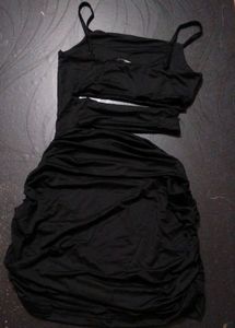 Sleek Black Cutout Bodycon Dress. Size :- M