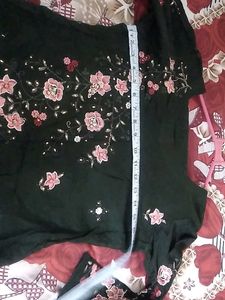 dark green kurti and pant set.