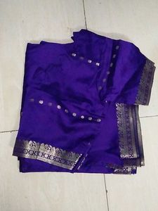 Elegant Purple Saree With Stiched Blouse .