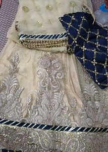 cream-colored lehenga choli
