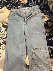 Ripped Light Wash Denim Jeans