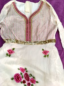 Elegant White Ethnic anarkali in good condition.