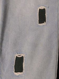 Ripped Light Wash Jeans