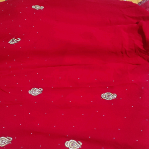 Shiffon bright red partywear saree, golden stone