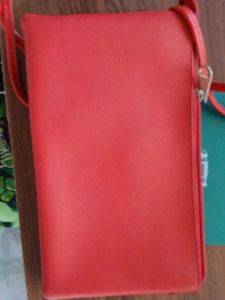 Red Sling Bag With Rainbow Design
