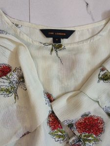 flower printed creamy blouson top